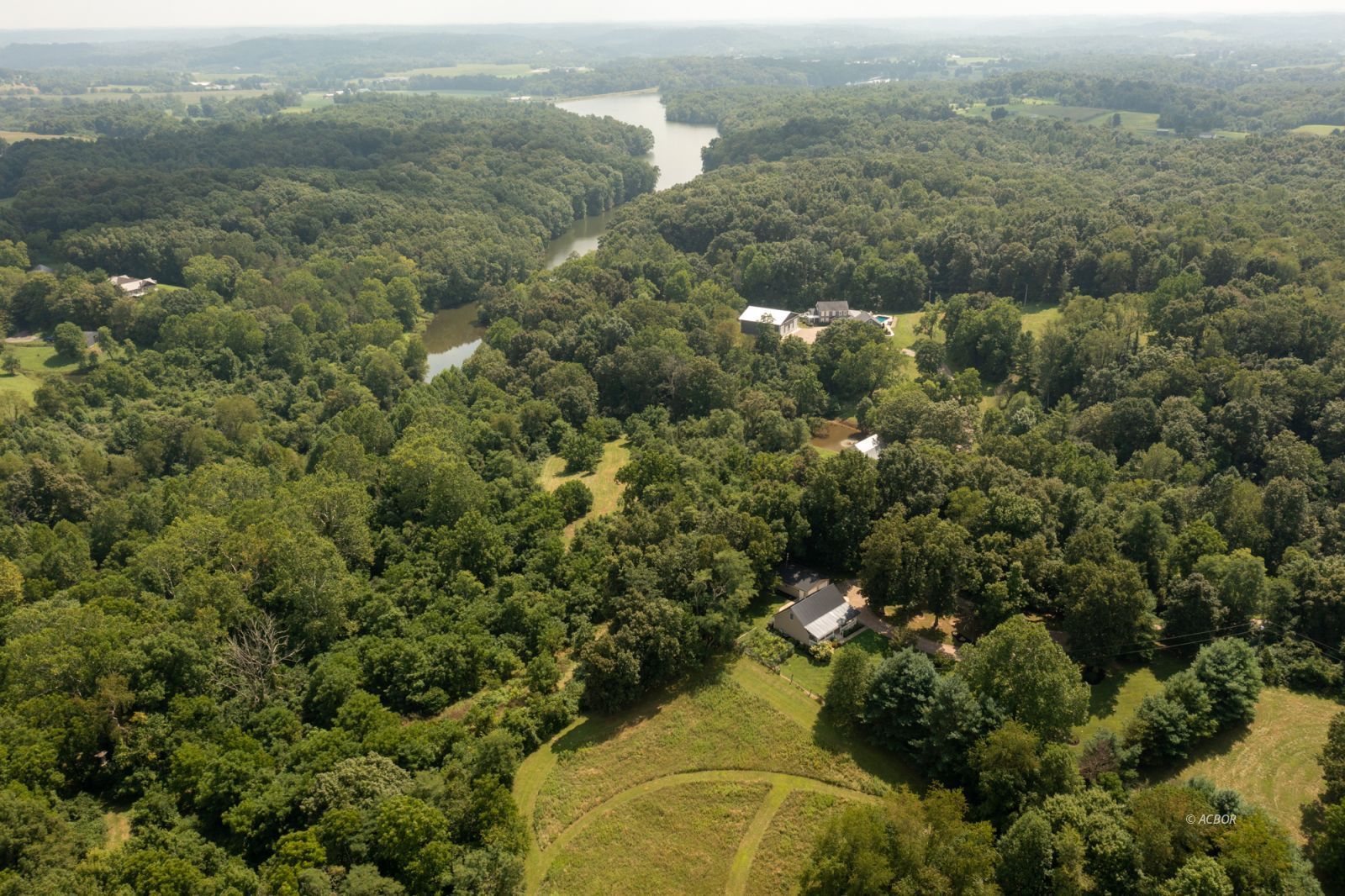 Aerial of land, house & Lake Snowden