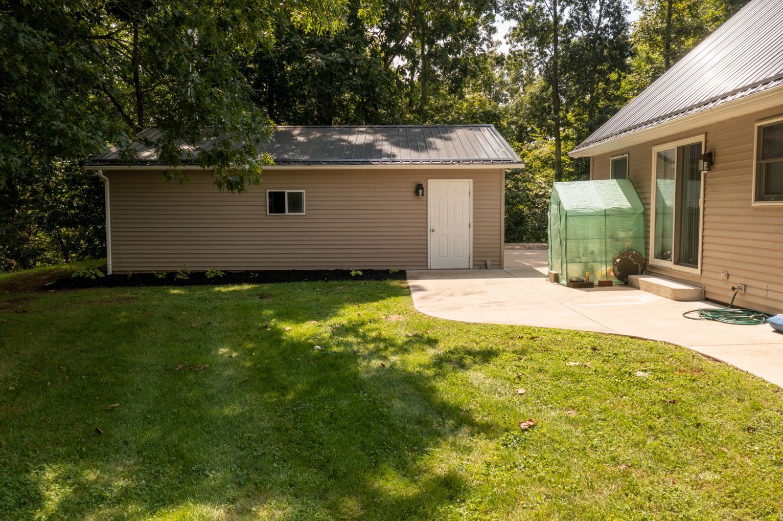 Rear of House and patio and garage