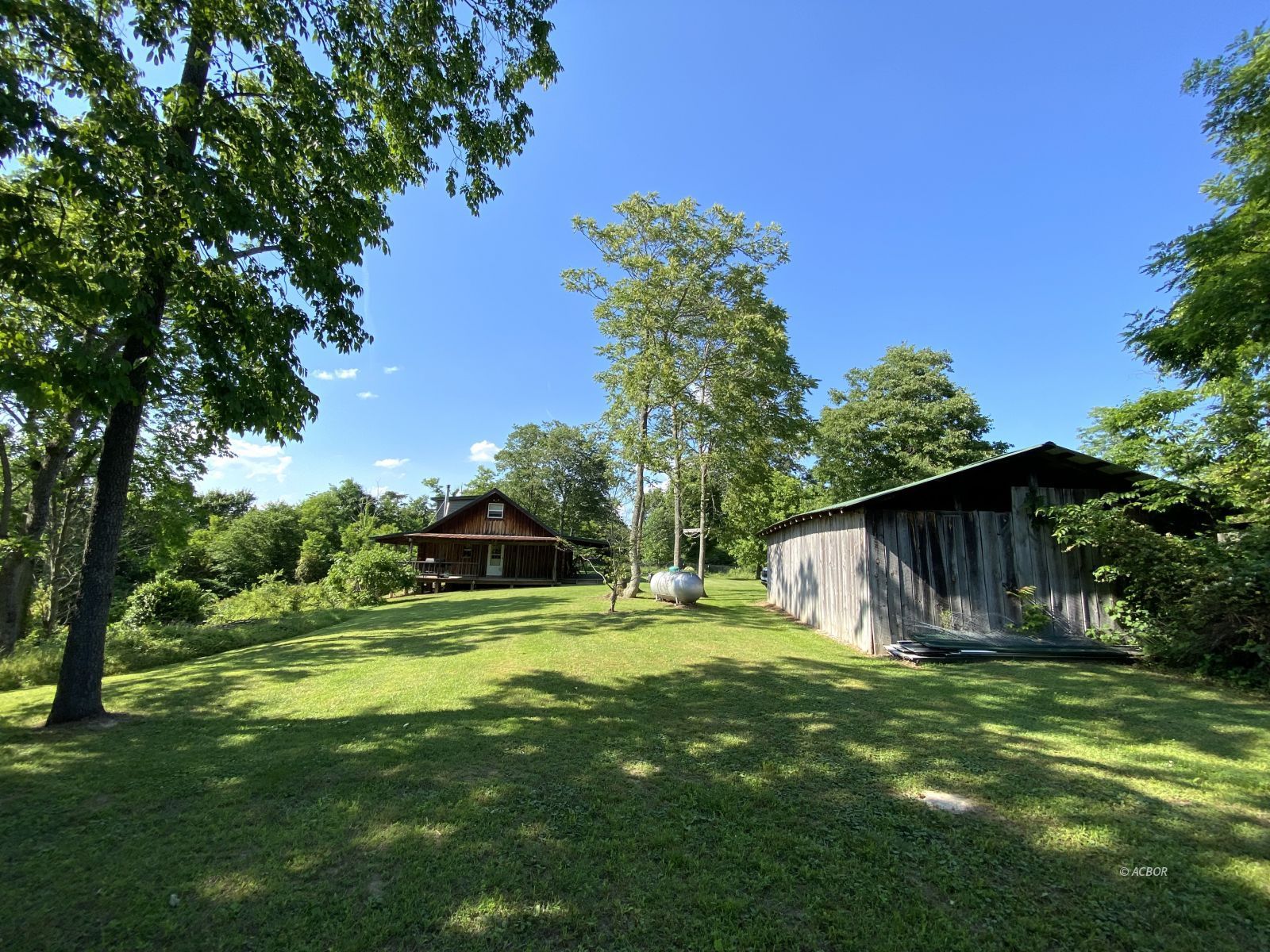 View of house and garage from filld